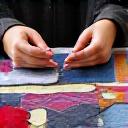 Stylist curating fabric swatches and ties